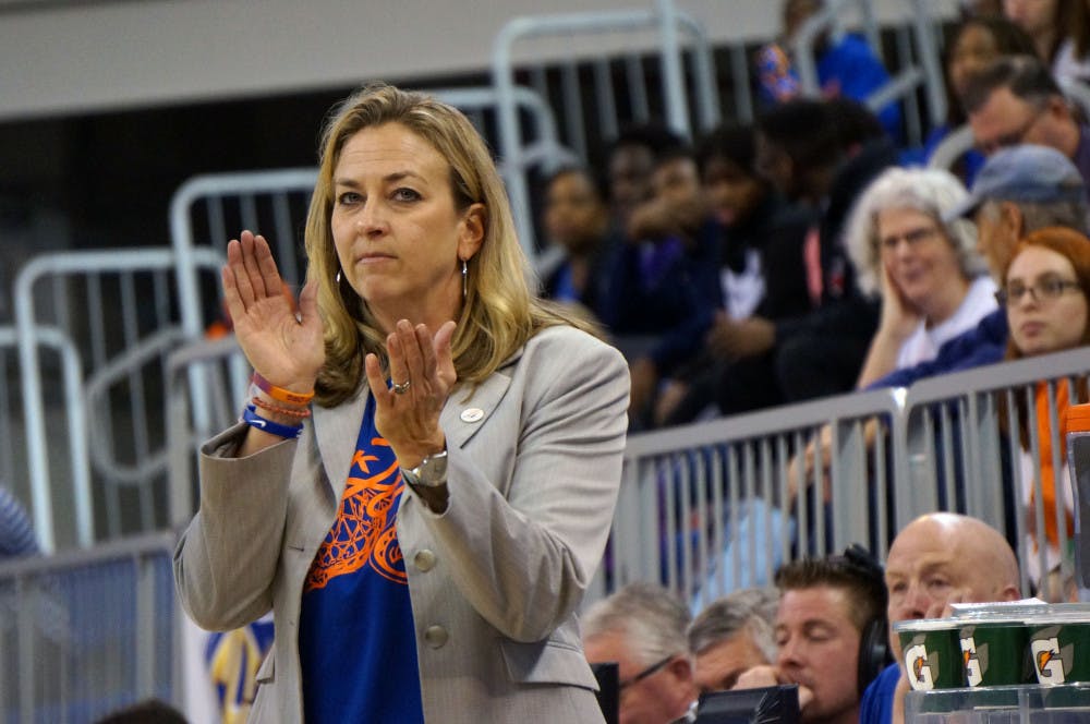 UF coach Amanda Butler claps during Florida's 53-45 win against LSU on Jan. 17, 2016, in the O'Connell Center.