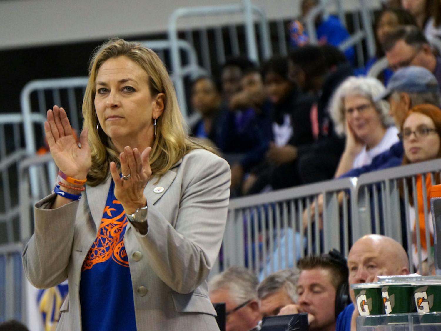 UF coach Amanda Butler claps during Florida's 53-45 win against LSU on Jan. 17, 2016, in the O'Connell Center.