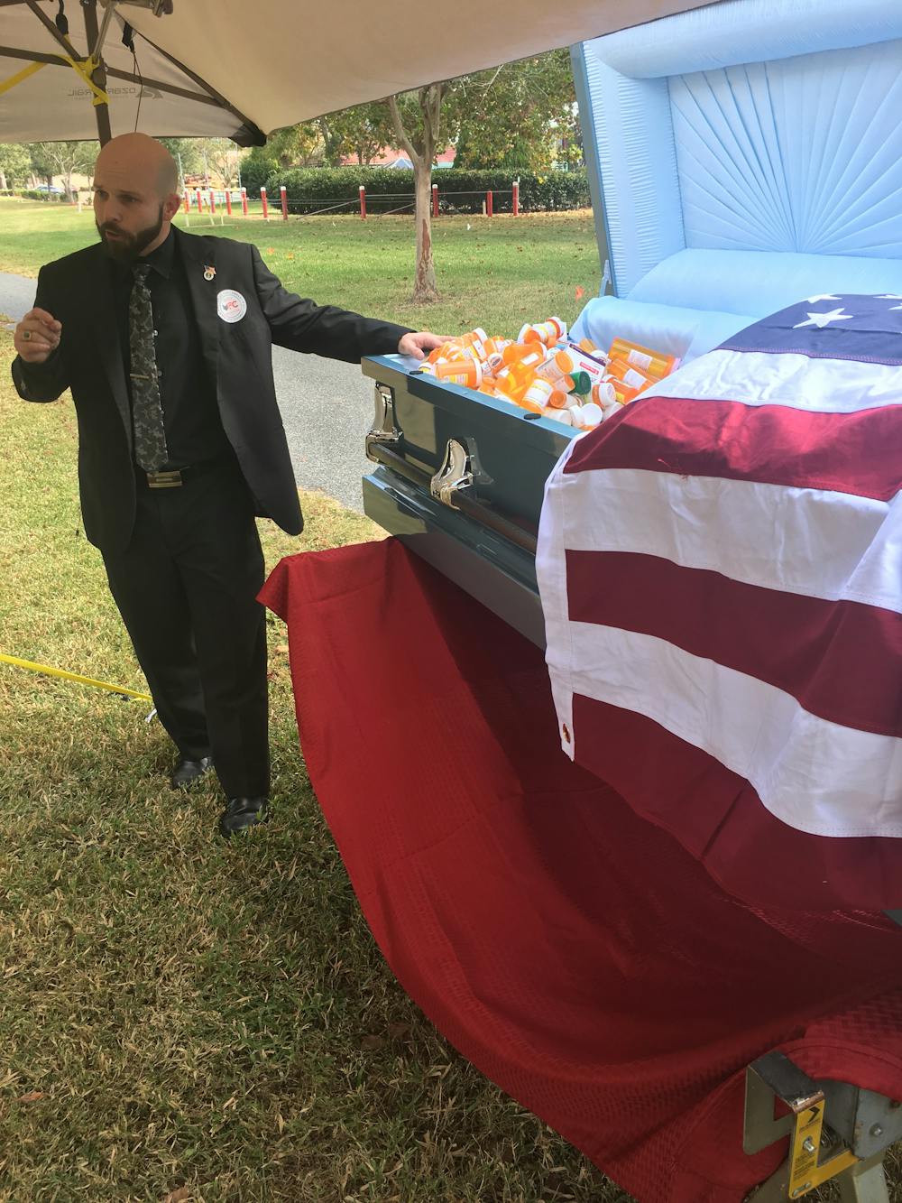 <p dir="ltr"><span>Veterans for Cannabis founder Joshua Littrell speaks about opioid deaths among veterans Saturday outside the Malcom Randall VA Medical Center, located at 1601 SW Archer Road. Littrell and four other veterans protested by filling a casket with empty prescription pill bottles. “Each one of these bottles is a brother and sister no longer with us,” he said.</span></p><p><span> </span></p>