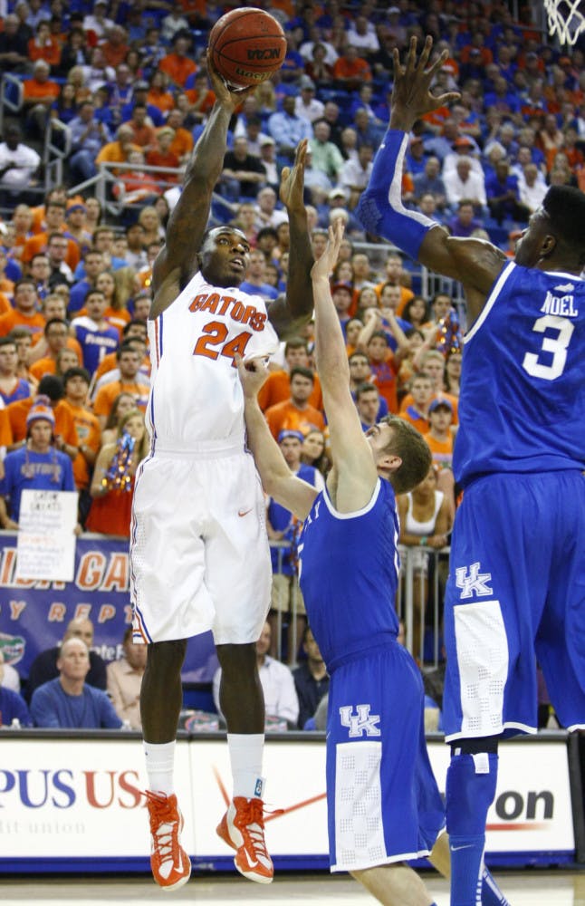Junior forward Casey Prather (24) attempts a shot during Florida’s 69-52 win against Kentucky on Tuesday in the O’Connell Center.