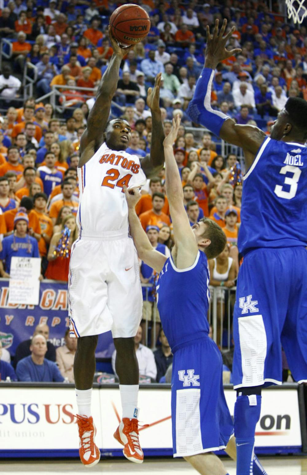 <p>Junior forward Casey Prather (24) attempts a shot during Florida’s 69-52 win against Kentucky on Tuesday in the O’Connell Center.</p>