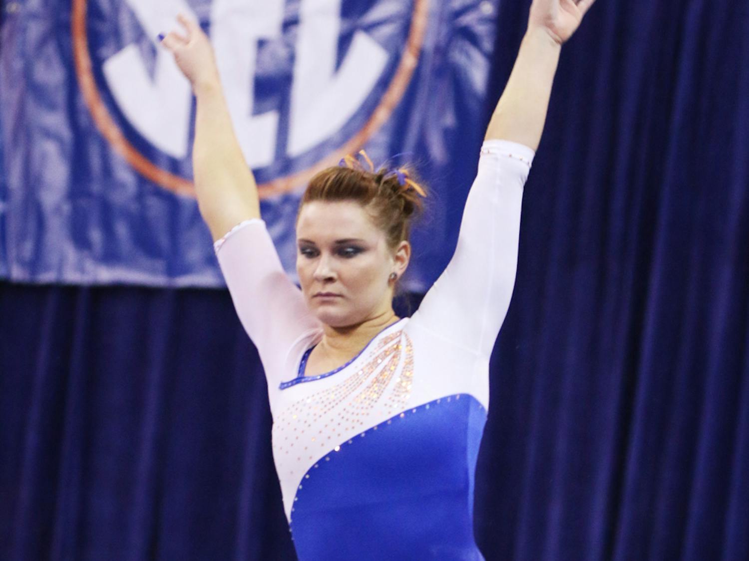 Bridget Sloan performs a beam routine during Florida’s 197.525-196.025 win against Arkansas on Feb. 14 in the O’Connell Center.