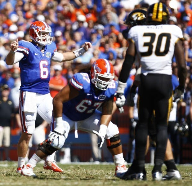 Quarterback Jeff Driskel signals to the Gators’ offense in Florida’s 14-7 win against Missouri on Saturday at Ben Hill Griffin Stadium. UF went to a hurry-up attack on its first two possessions.&nbsp;
