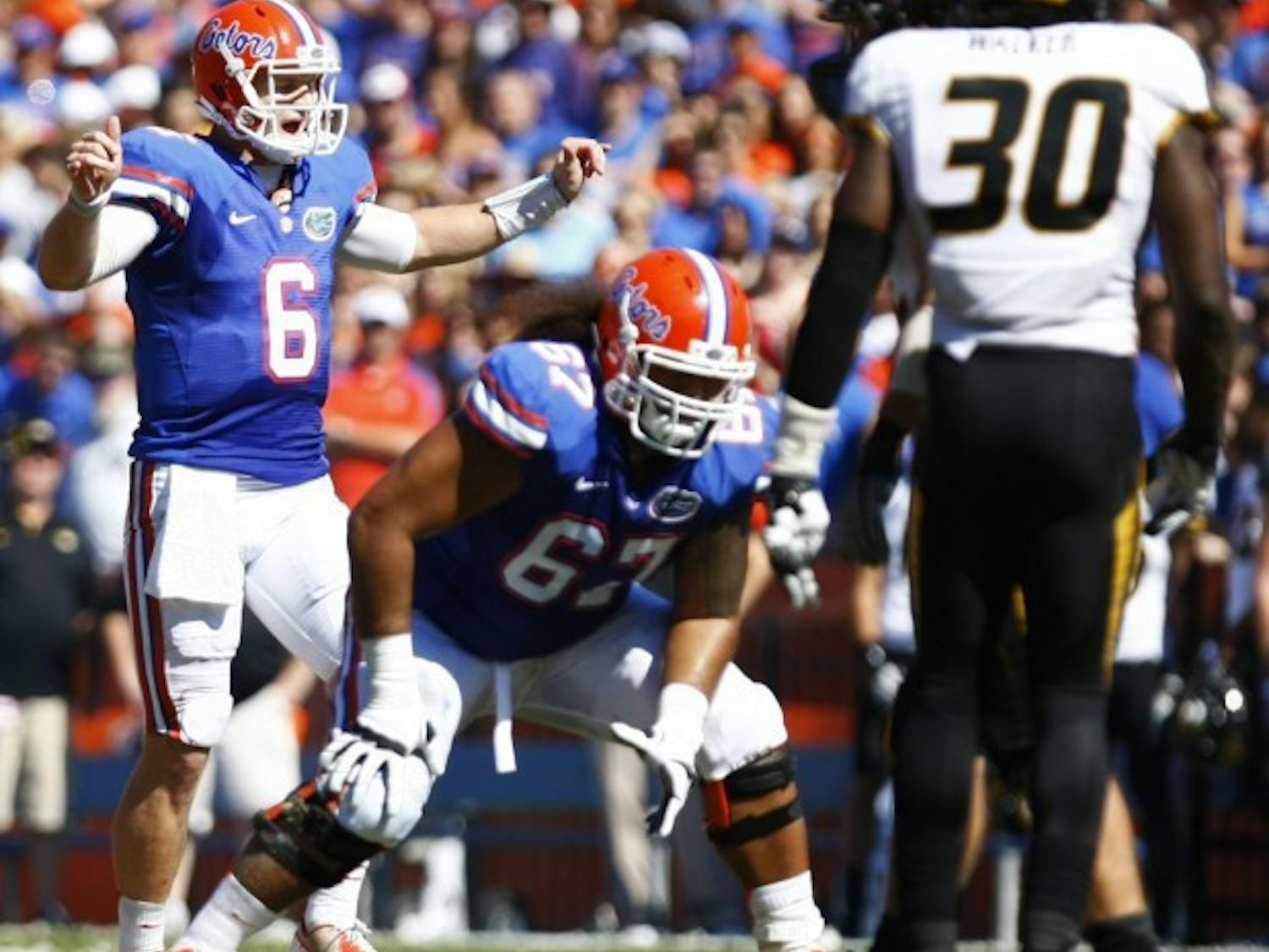 Quarterback Jeff Driskel signals to the Gators’ offense in Florida’s 14-7 win against Missouri on Saturday at Ben Hill Griffin Stadium. UF went to a hurry-up attack on its first two possessions.&nbsp;
