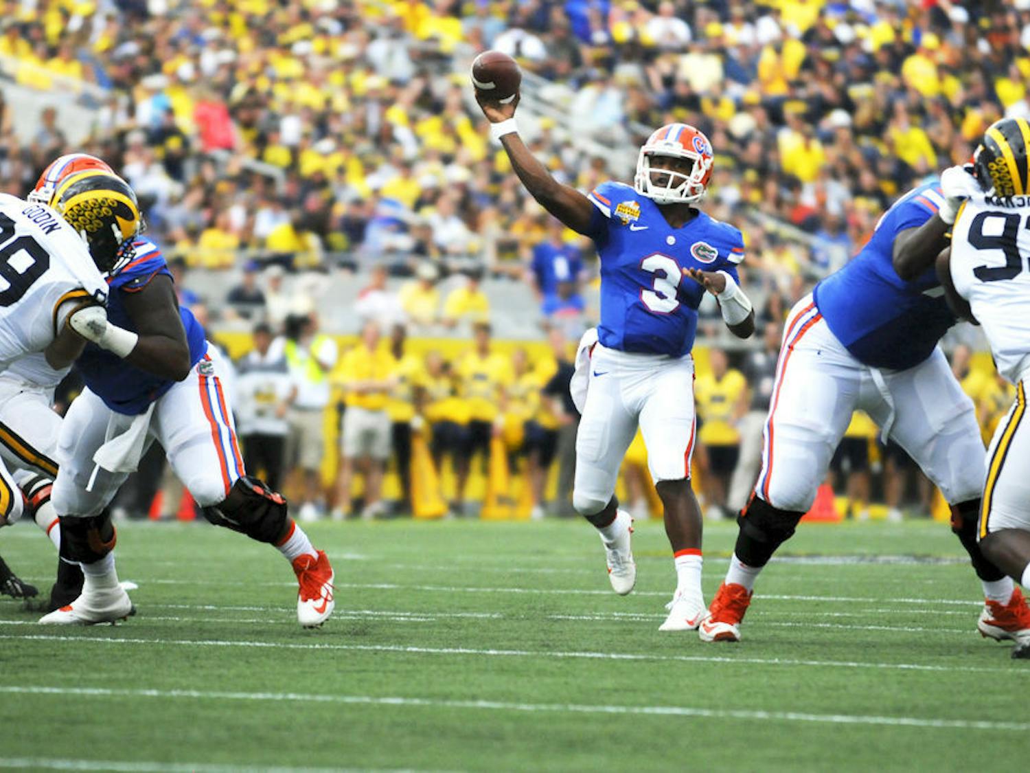 UF quarterback Treon Harris (3) passes during Florida's 41-7 loss to Michigan in the Citrus Bowl on Jan. 1, 2016, in Orlando.