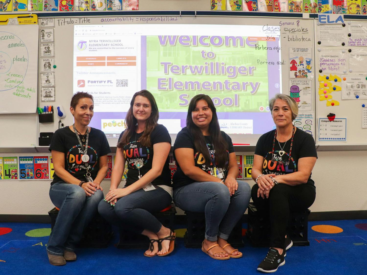  Dual language teachers Mayte Ambite-Calvo, Desiree DiPerna, Gabby Smolenski and Ana Zuber sit at the front of Ambite-Calvo's classroom at Terwilliger Elementary School on Friday, Sept. 22, 2023. 
