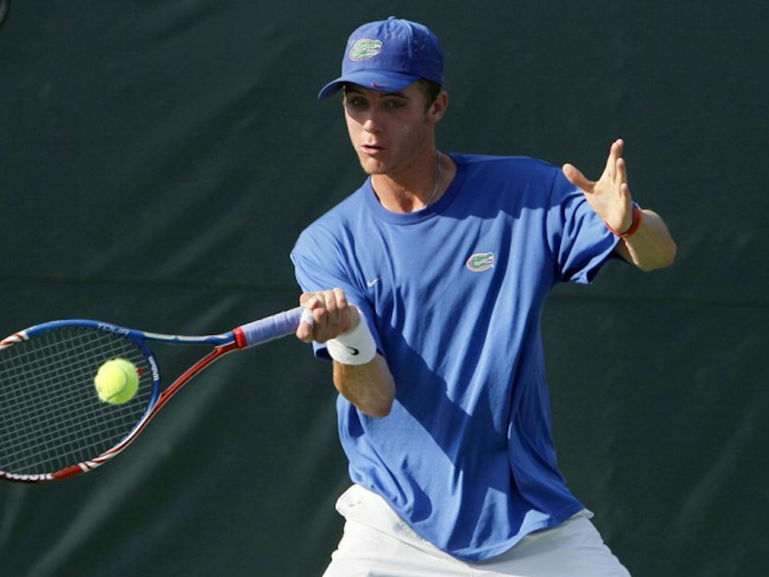 Florida senior Bob van Overbeek returns a volley last season. Van Overbeek was demoted to No. 3 singles during his losing streak.
