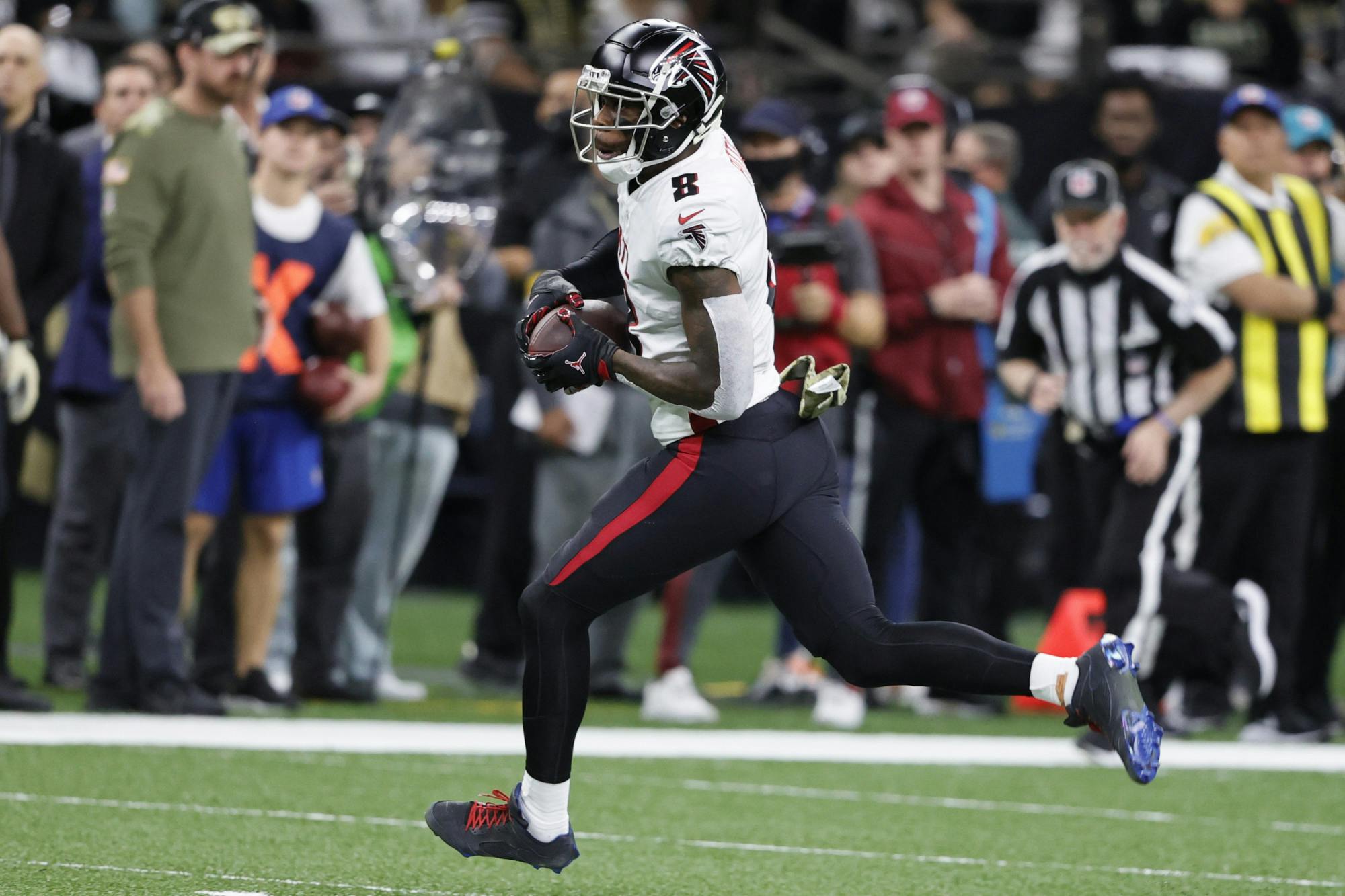 Atlanta Falcons tight end Kyle Pitts (8) runs against the New Orleans Saints during the first half of an NFL football game, Sunday, Nov. 7, 2021, in New Orleans. (AP Photo/Butch Dill)