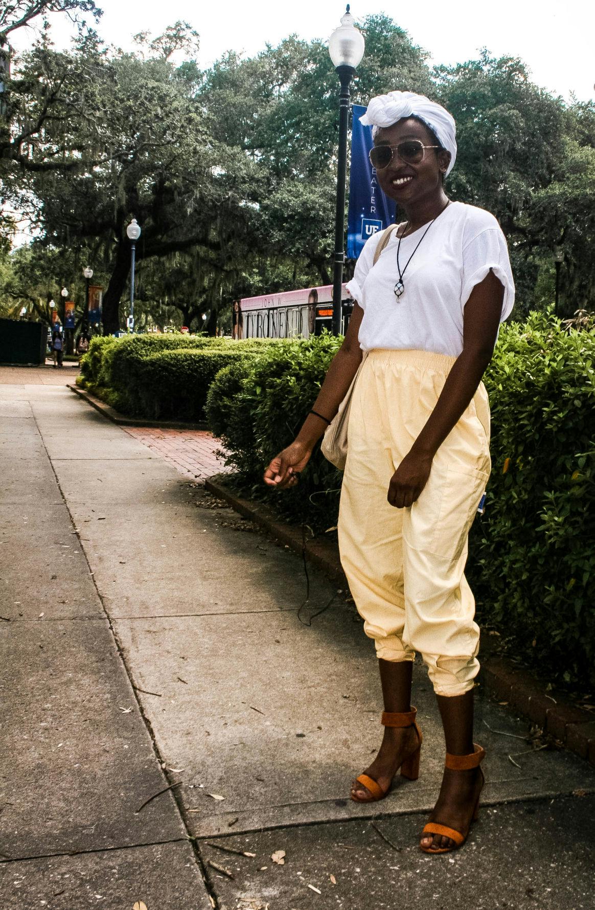 Juana Viel, 18, wears pastel pants while power-walking to class in heels a 100 degree heat index without breaking a sweat.