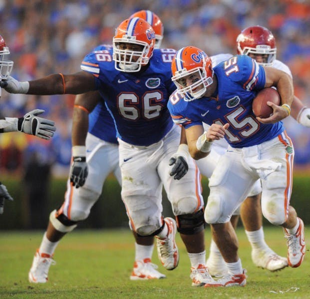 Senior guard James Wilson (66) blocked for Tim Tebow (15) for three seasons at Ponte Vedra Nease High before both moved on to Florida. Although Tebow would win a Heisman Trophy, Wilson was the more heralded recruit, ranking as the nation’s 12th-best player in the class of 2007, according to Rivals.com. Tebow ranked 22nd in the class of 2006.
