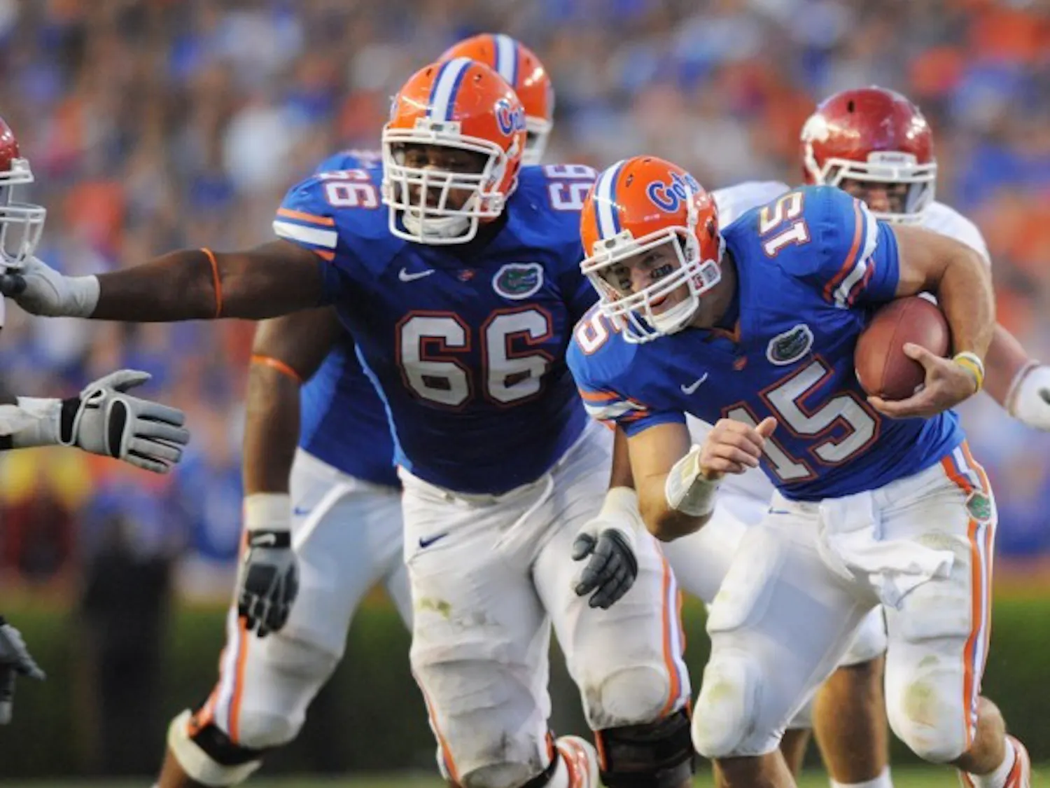 Senior guard James Wilson (66) blocked for Tim Tebow (15) for three seasons at Ponte Vedra Nease High before both moved on to Florida. Although Tebow would win a Heisman Trophy, Wilson was the more heralded recruit, ranking as the nation’s 12th-best player in the class of 2007, according to Rivals.com. Tebow ranked 22nd in the class of 2006.