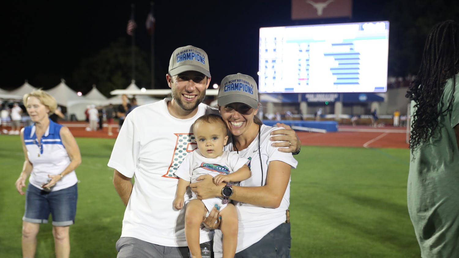 Will and Samantha Palmer pose with their son Liam during the Gators' National Championship meet Friday, June 9, 2023 at Mike Myers Stadium in Austin, Texas.