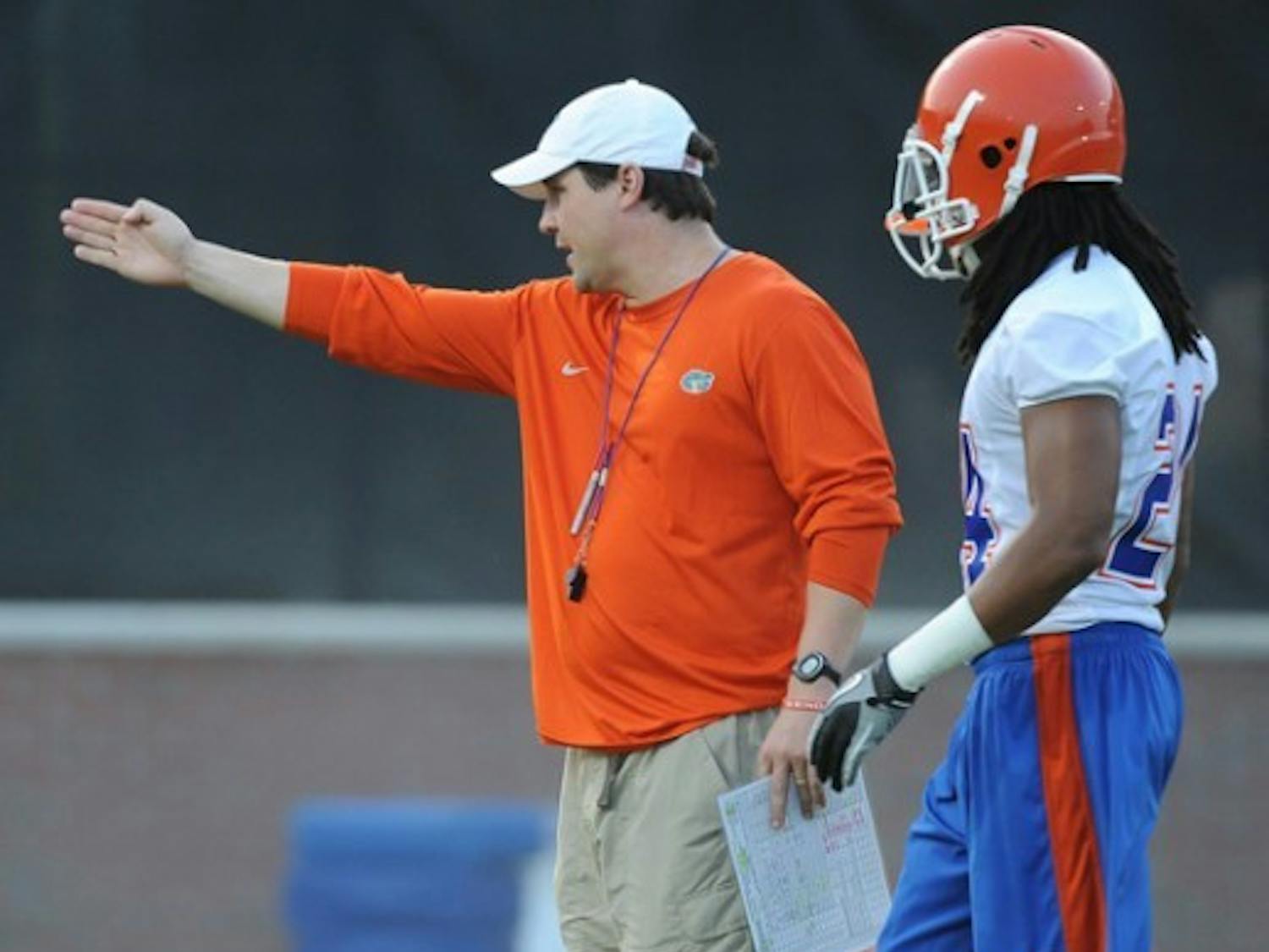 Florida coach Will Muschamp said Saturday he’s comfortable with wide receivers coach Aubrey Hill’s alleged involvement with jailed Miami booster Nevin Shapiro.