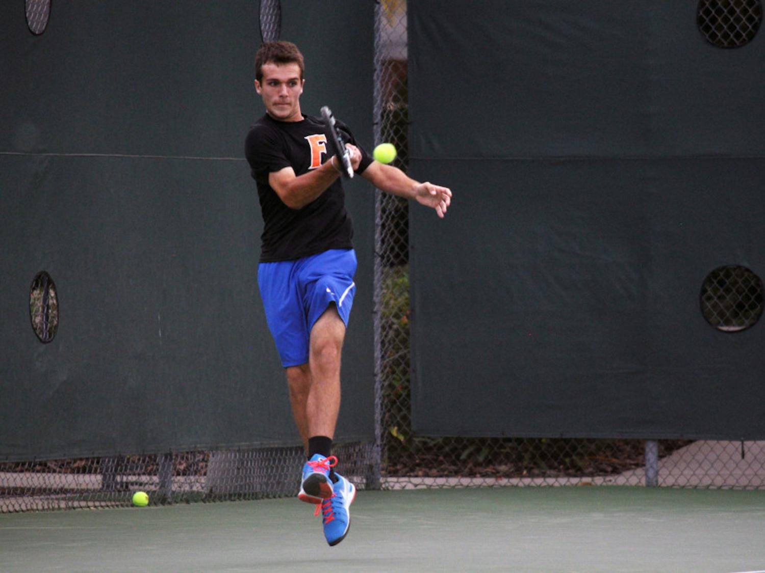 Chase Perez-Blanco returns a ball during Florida's 4-1 win against Mississippi State on March 13 at the Ring Tennis Complex.