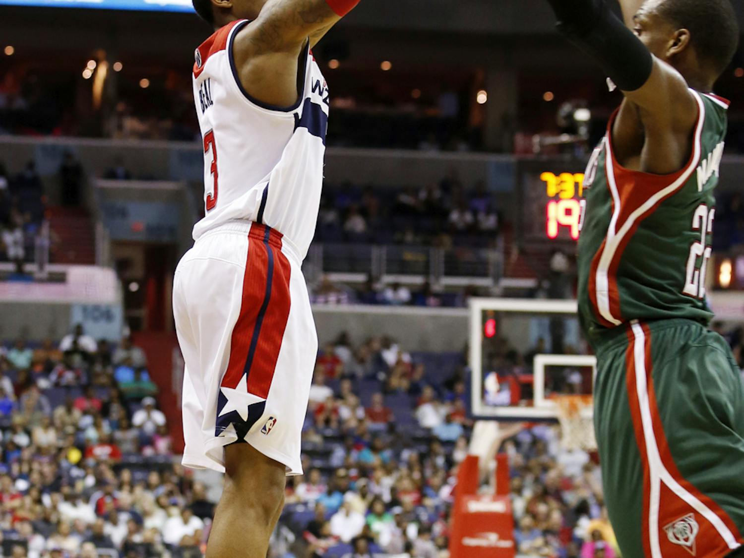 Wizards guard Bradley Beal (3) shoots during Washington’s 104-91 win against the Milwaukee Bucks on Saturday.