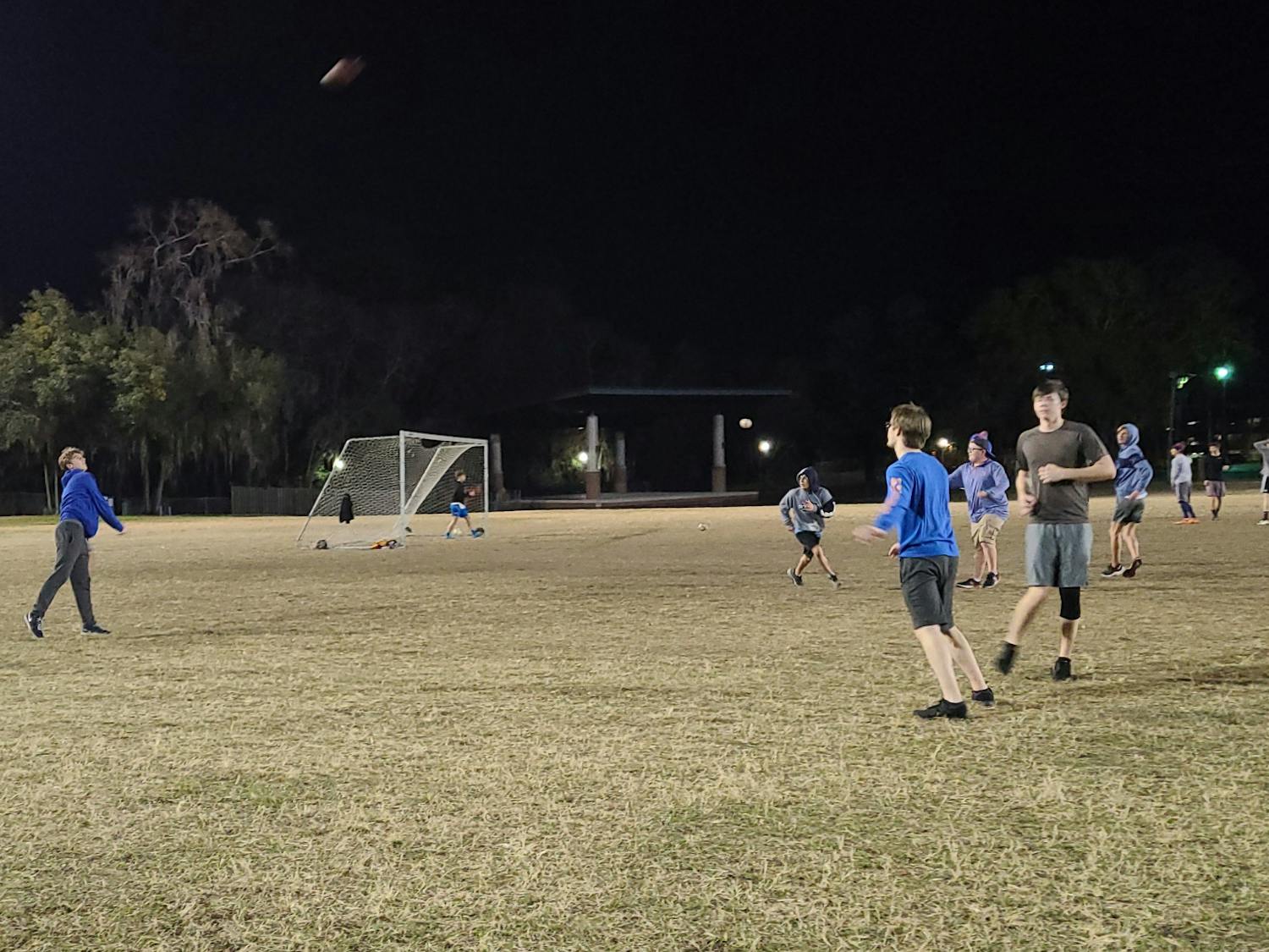 Freshman Campbell Harmon throws a shot during a quick Sunday-night pickup football game.