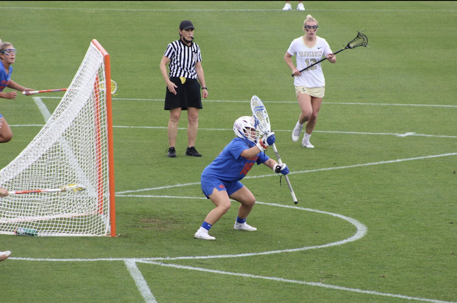 Sarah Reznick guards the net during a rainy conference affair against Vanderbilt 2021. She recorded nine saves in the quarterfinals matchup against Maryland.