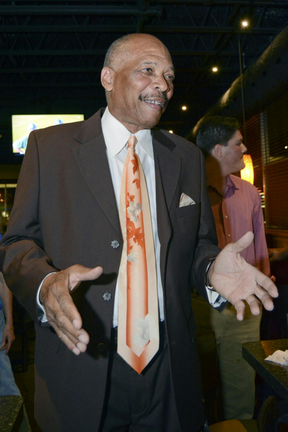 <p>Commissioner-elect Charles Goston celebrates his victory over Yvonne Hinson-Rawls in the District 1 commissioner seat election in Piesanos Stone Fired Pizza on University Avenue on Tuesday night. Goston won with 913 votes against Hinson-Rawls’ 844.</p>