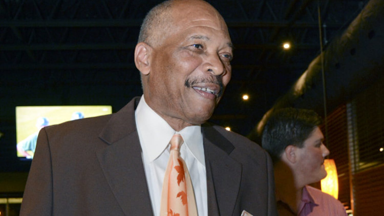 Commissioner-elect Charles Goston celebrates his victory over Yvonne Hinson-Rawls in the District 1 commissioner seat election in Piesanos Stone Fired Pizza on University Avenue on Tuesday night. Goston won with 913 votes against Hinson-Rawls’ 844.