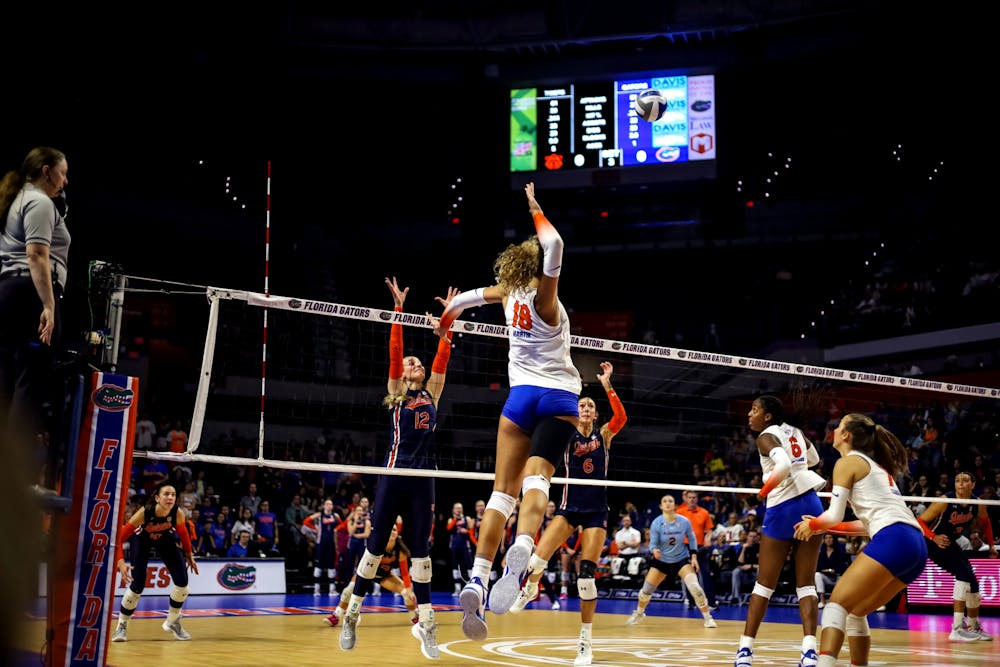 Freshman outsider hitter Kennedy Martin hits the ball in the Gators' 3-0 loss to the Auburn Tigers on Friday, Oct. 6, 2023.