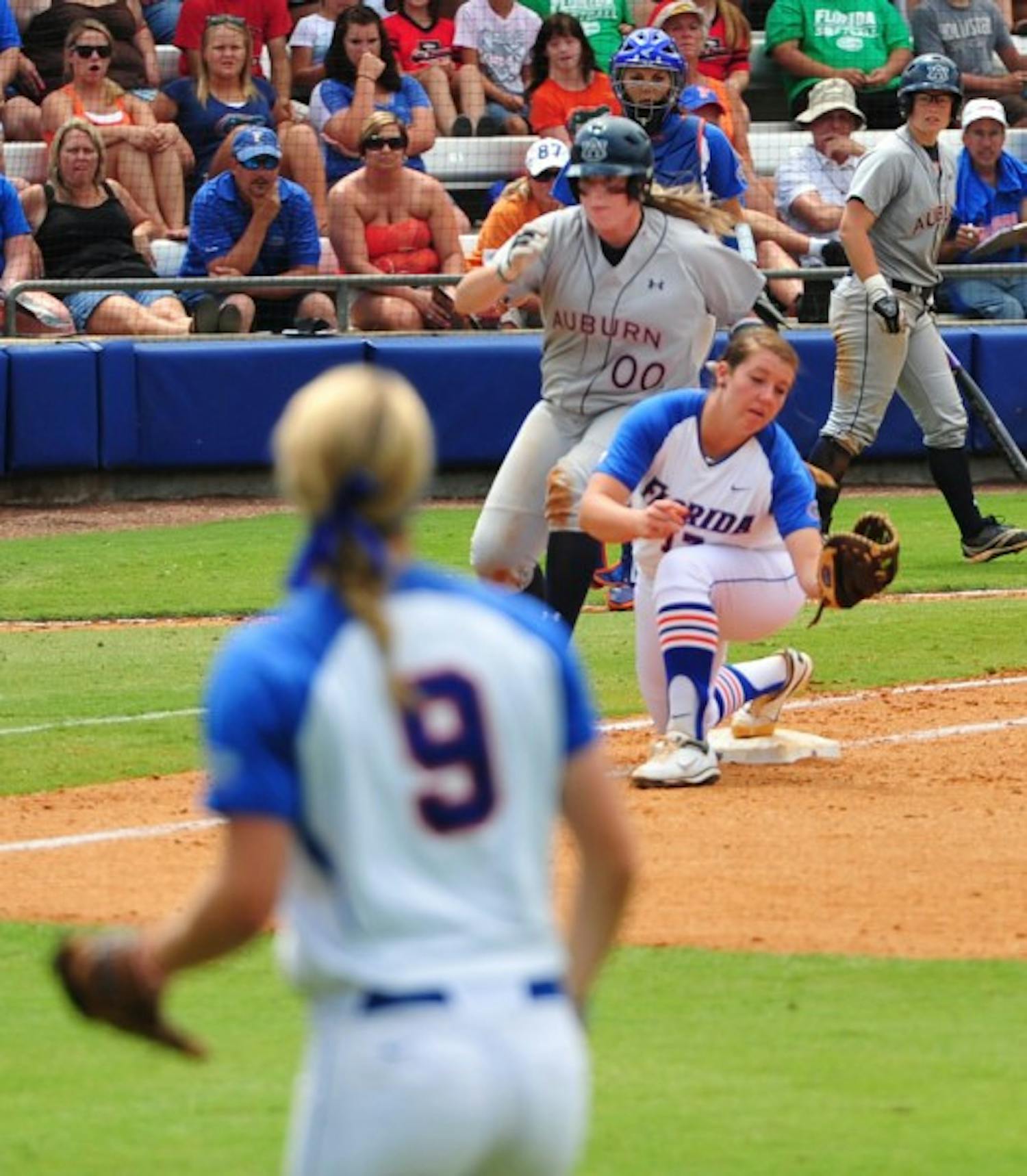 Florida right fielder Kasey Fagan throws out Auburn first baseman Caitlin Jordan during the top of the sixth inning of the Gators’ 5-1 win on Sunday.