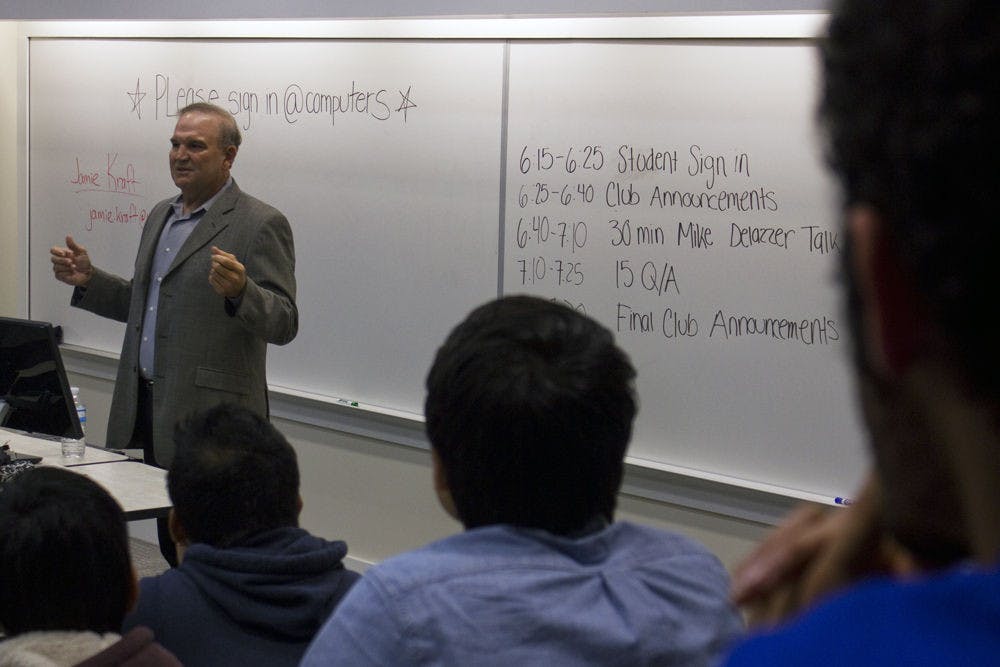 Redbox co-founder Mike DeLazzer speaks in Heavener Hall on Tuesday. He told the story of how the company was started and answered questions in front of about 100 people at a meeting of the Entrepreneurship Club.