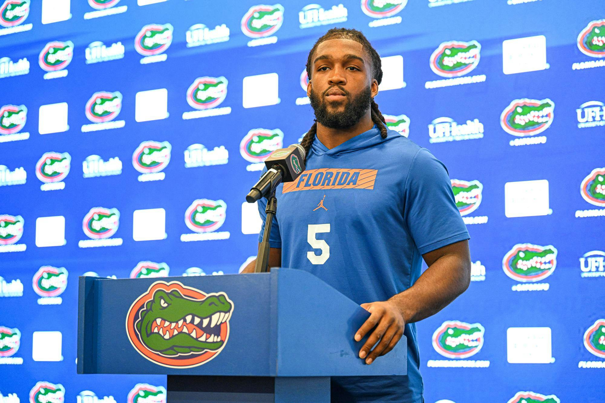Florida Gators inside linebacker Myles Graham (5) speaks after Billy Gonzales at the interim coach’s opening press conference on Monday, Oct. 20, 2025, in Gainesville, Fla.