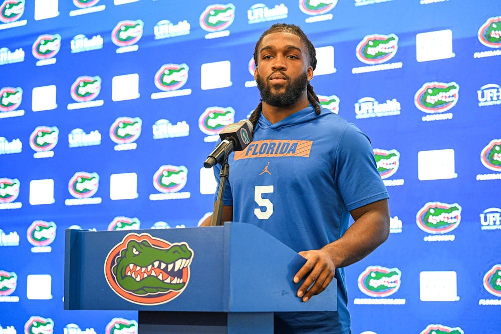 Florida Gators inside linebacker Myles Graham (5) speaks after Billy Gonzales at the interim coach’s opening press conference on Monday, Oct. 20, 2025, in Gainesville, Fla.