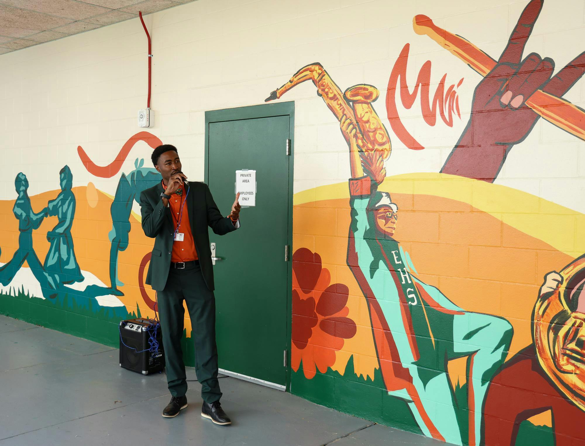 Principal Leroy Williams speaks at the unveiling of the mindful messages mural, Tuesday, March 31, 2026, in Gainesville, Fla.