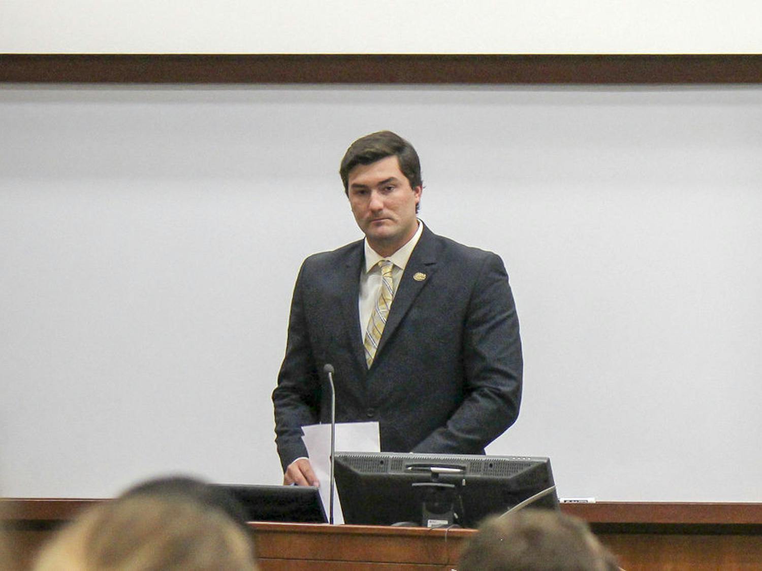 Sen. Davis Bean, chairman of the budget and appropriations committee, discusses the budget during Tuesday’s Student Senate meeting.