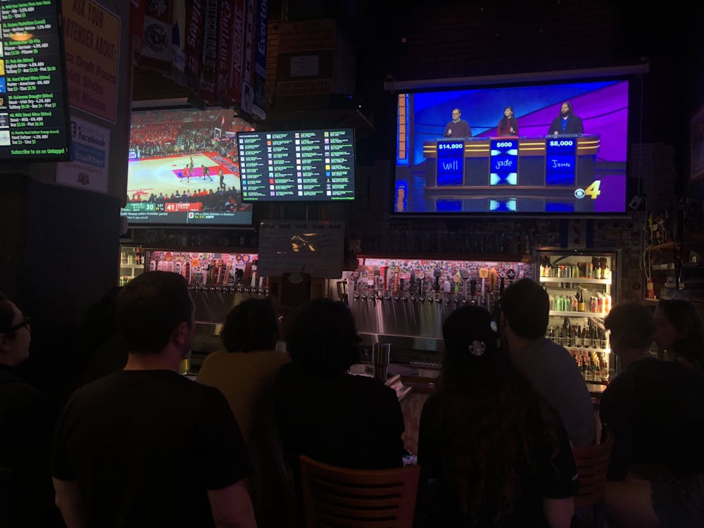<p>Jade Ryan, a 25-year-old UF English senior, and her friends watch her compete on "Jeopardy!" Tuesday night <span>at House of Beer, at 19 W. University Ave</span>. </p>
