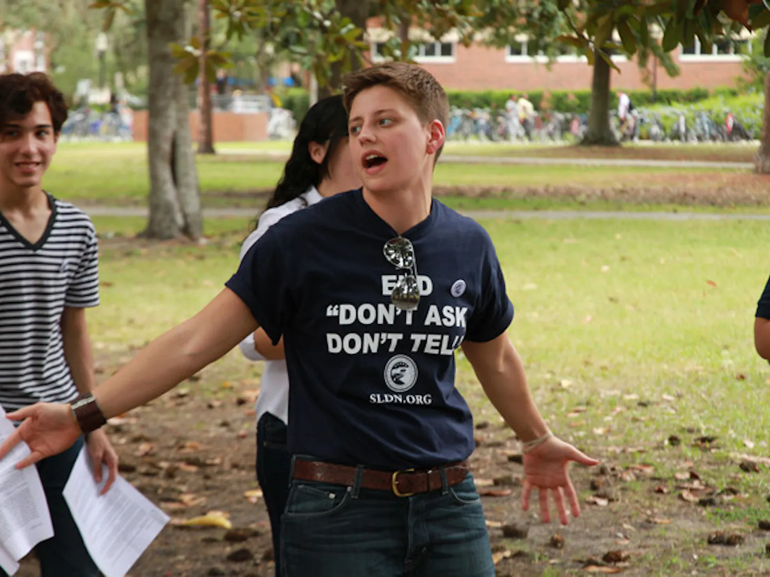 Lauren Hannahs, 27, director of LGBT affairs for UF, hosts a rally celebrating the repeal of "Don't Ask, Don't Tell" on Plaza of the Americas on Tuesday.