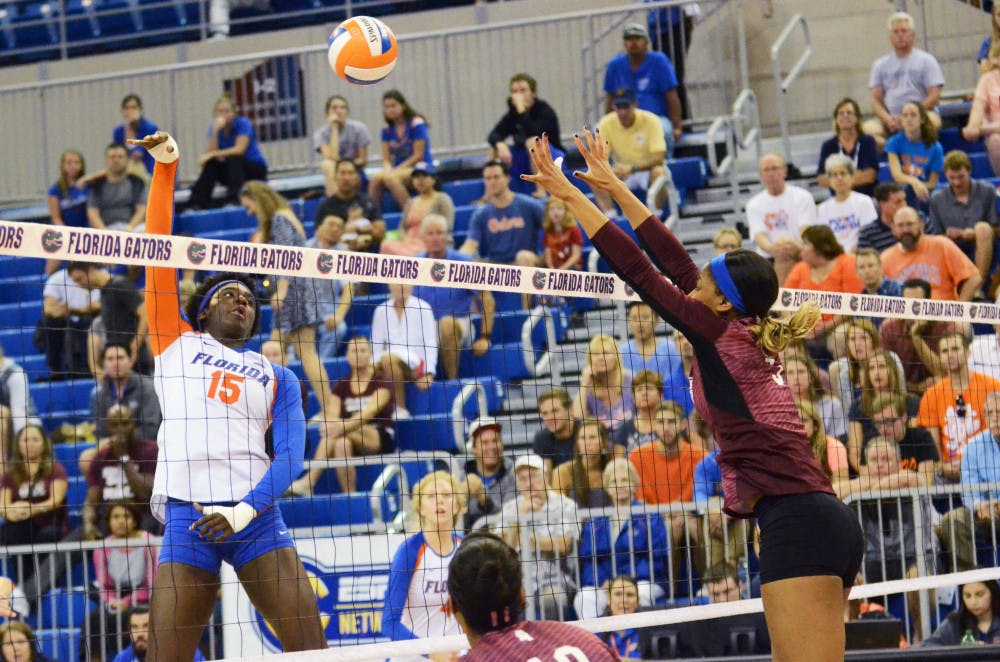 <p>UF's Shainah Joseph swings for a kill attempt against Mississippi State. The sophomore middle blocker recorded seven kills and five blocks as No. 8 seed Florida defeated ninth-seed Illinois in the third round of the NCAA Tournament on Friday in Ames, Iowa.</p>