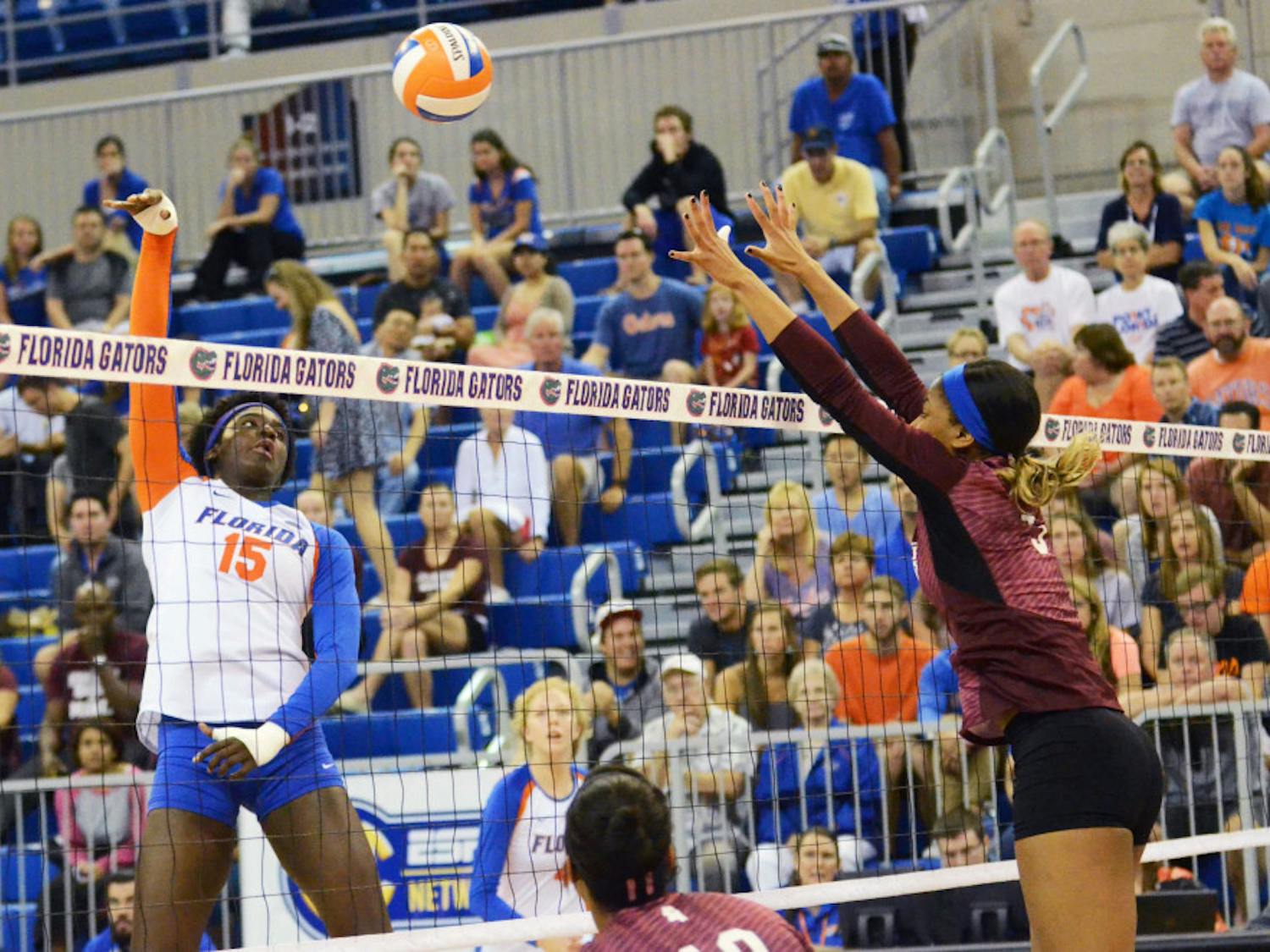 UF's Shainah Joseph swings for a kill attempt against Mississippi State. The sophomore middle blocker recorded seven kills and five blocks as No. 8 seed Florida defeated ninth-seed Illinois in the third round of the NCAA Tournament on Friday in Ames, Iowa.