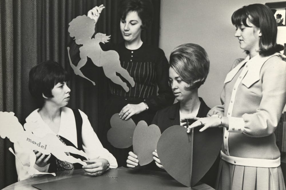 <p>University Women’s Club members gather for a social event held between the years 1969 and 1970. </p><p><br/><br/></p>