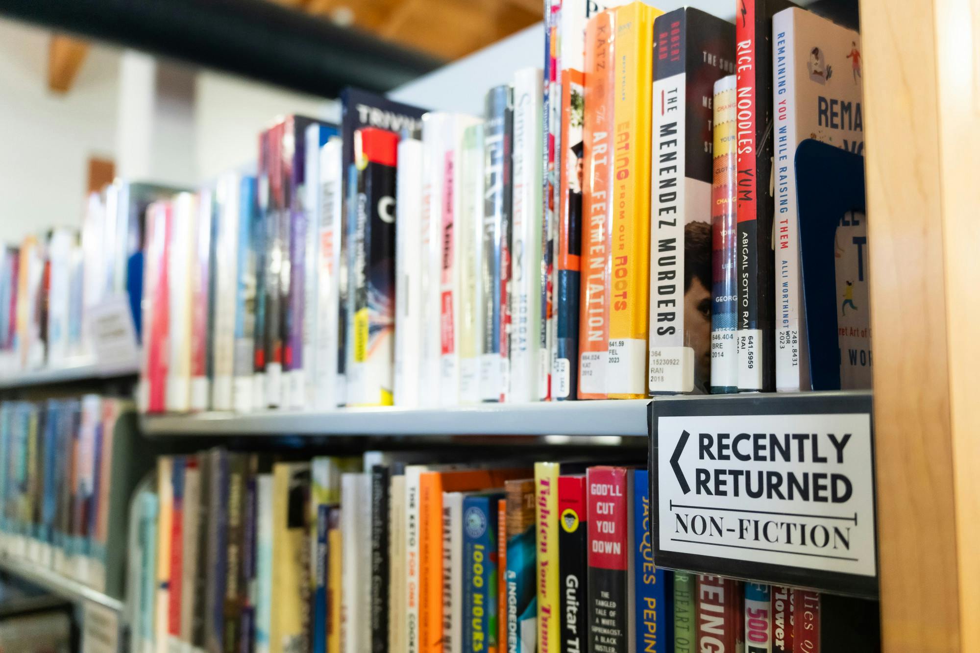 Returned books wait to be reshelved at Alachua County Tower Road library on Oct. 20, 2024.