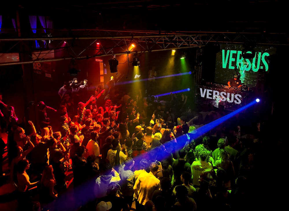 <p>At the end of his set, EDM DJ Versus encourages house music fans to dance freely to the beat at Vivid Music Hall on Friday, January 17, 2025.</p>