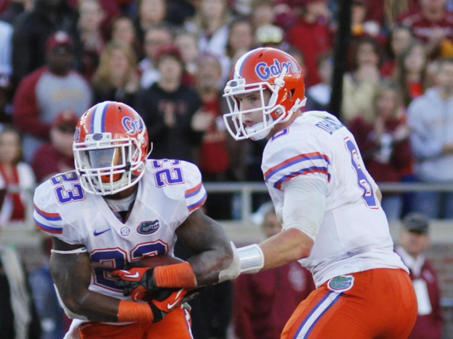Mike Gillislee (23) takes a handoff from quarterback Jeff Driskel (6) against FSU on Nov. 24. Gillislee ran for 1,152 yards in 2012.