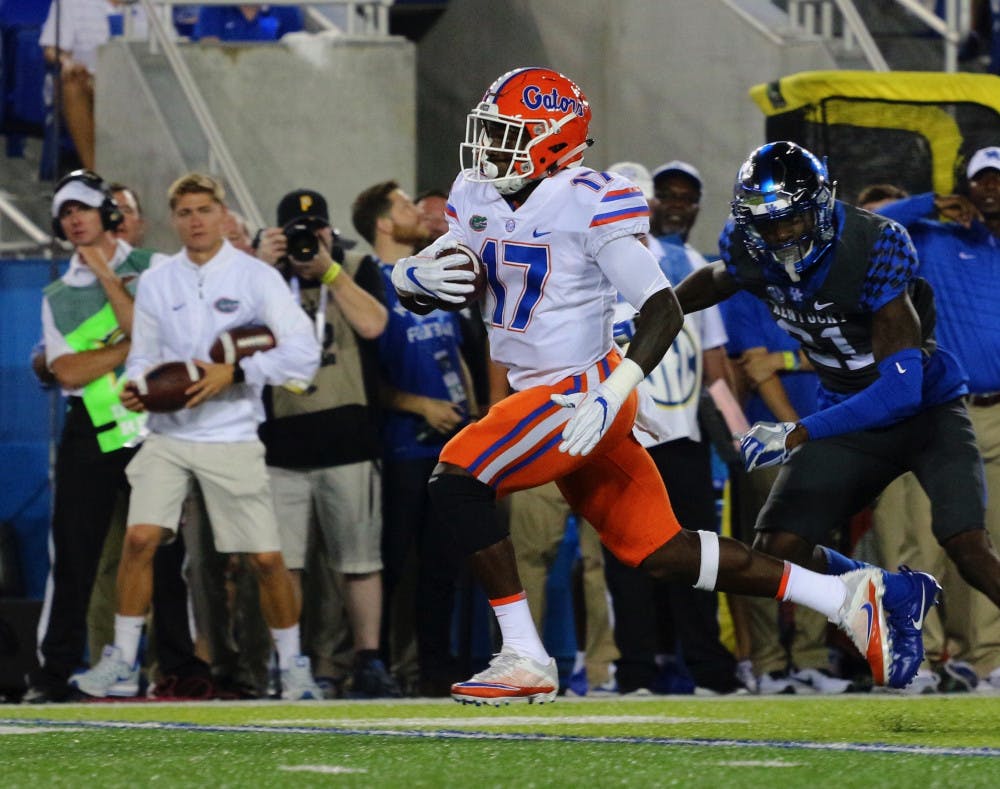 <p>Kadarius Toney carries the ball during Florida's 28-27 victory over Kentucky on Sept. 23, 2017, at Kroger Field.</p>