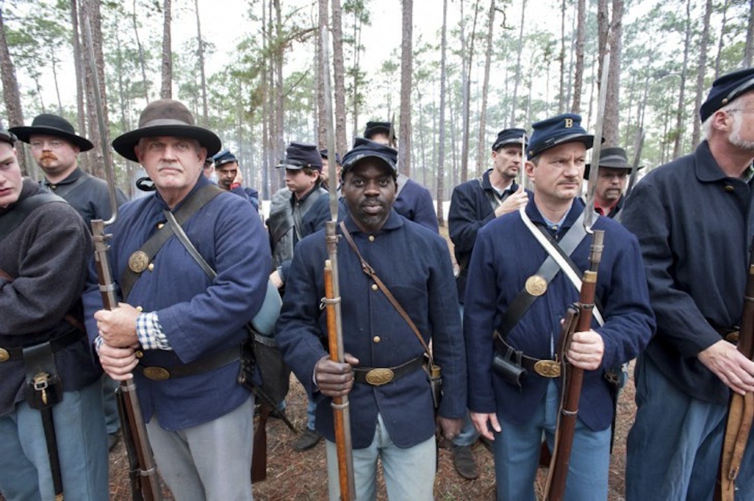 Edgar McCray, of the 54th Regiment Massachusetts Volunteer Infantry, stands in formation during an afternoon inspection Saturday.
&nbsp;