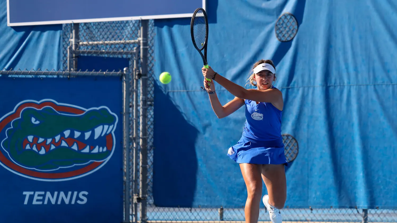 Florida’s Lucie Pawlak hits the ball during an NCAA women’s doubles tennis match against Maria Andrienko and Amina Salibayeva of Alabama, March 26, 2026, in Gainesville, Fla.