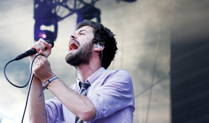 Passion Pit frontman Michael Angelakos sings to thousands of fans at Lollapalooza during summer 2012. Passion Pit will be performing Oct. 24 at the Stephen C. O’Connell Center.