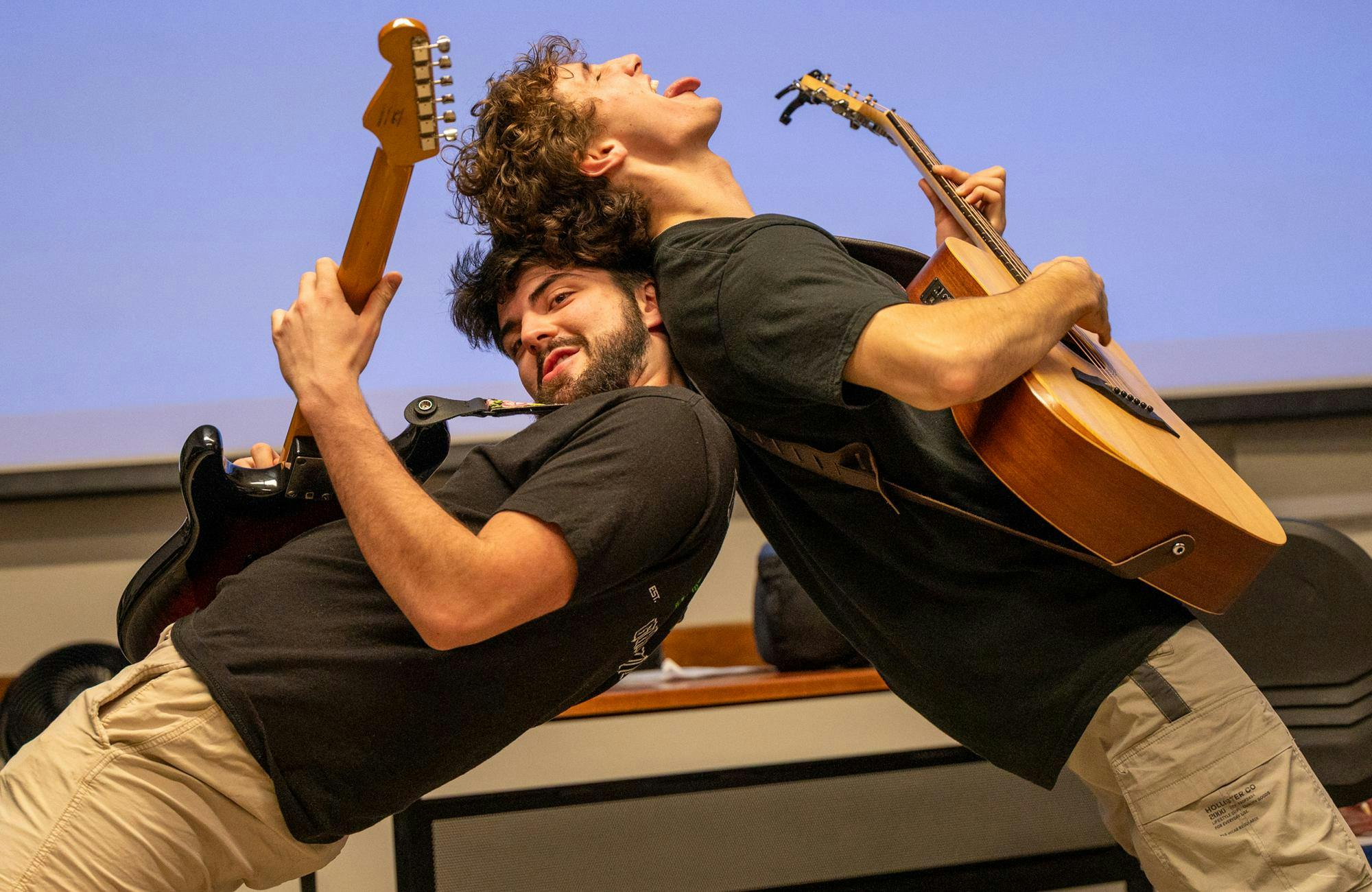 Nicholas Hart and Cooper LaMontagne play guitar together at a rehearsal of Hedwig and the Angry Inch on UF Campus, Wednesday, February. 11, 2026, in Gainesville, Fla.