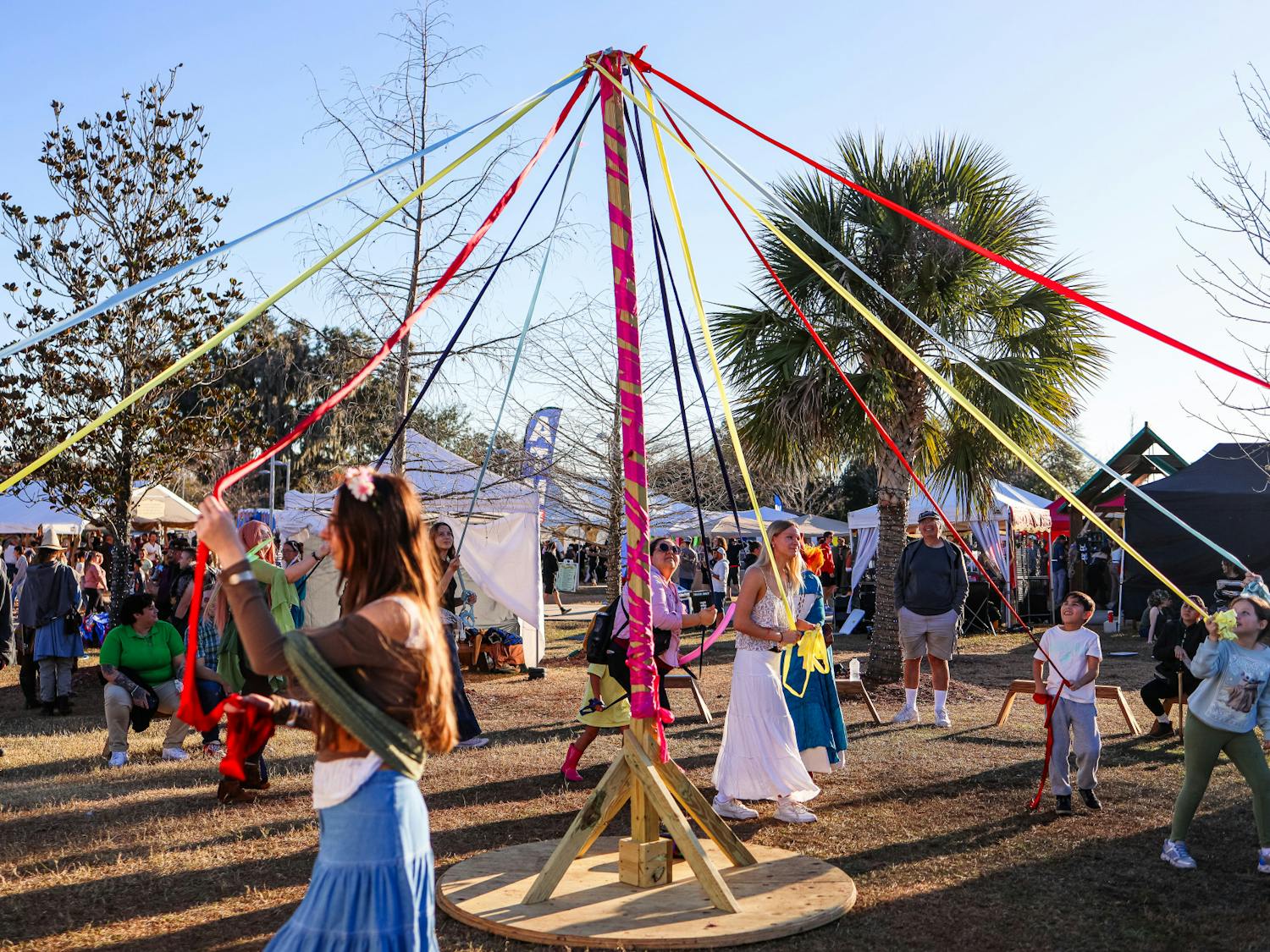 Ribbon pole game during Hoggetowne Medieval Faire on Sunday, Jan. 26, 2025.