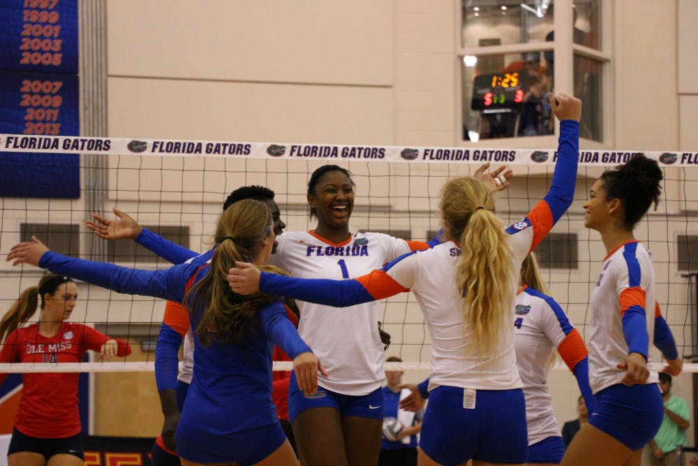 <p>Rhamat Alhassan (1) celebrates with teammates during Florida's 3-0 win over Ole Miss on Oct. 28, 2016, in the Lemerand Center.</p>