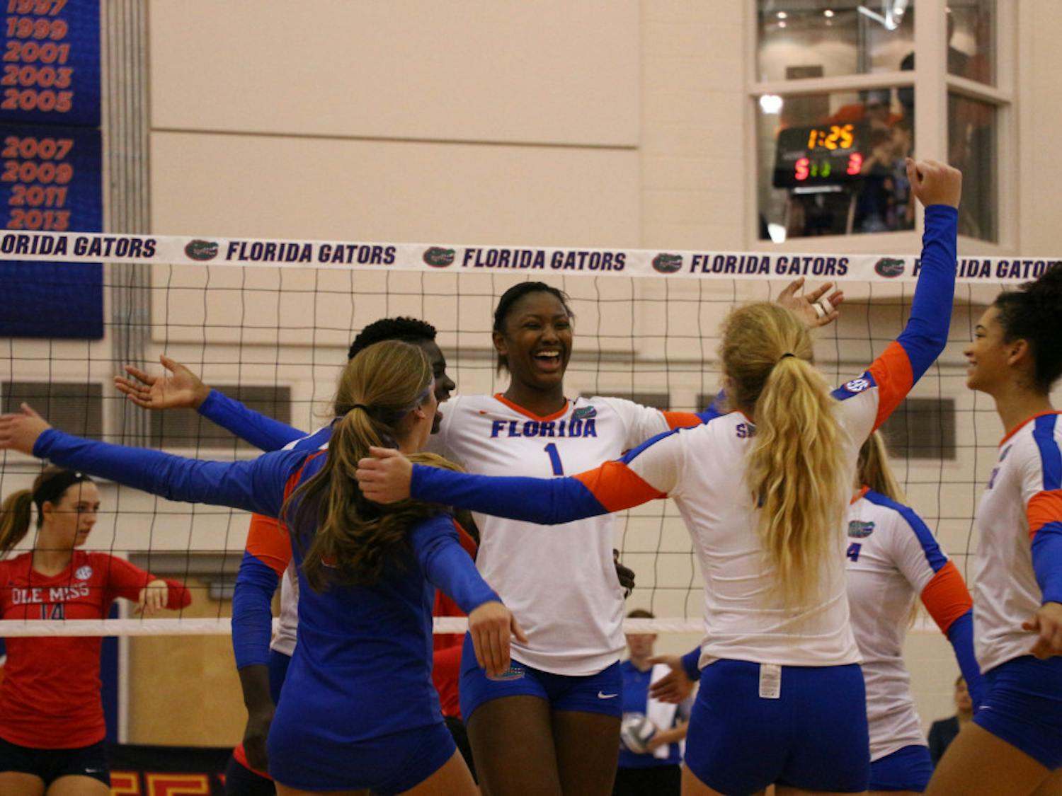 Rhamat Alhassan (1) celebrates with teammates during Florida's 3-0 win over Ole Miss on Oct. 28, 2016, in the Lemerand Center.
