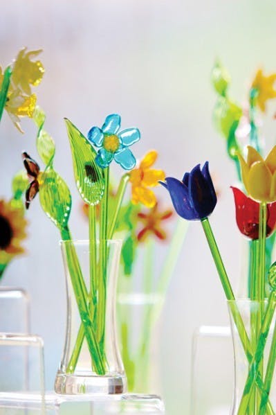 Hand-blown glass flowers adorn the shop at Thornebrook Gallery, which will celebrate its 30th anniversary throughout September.