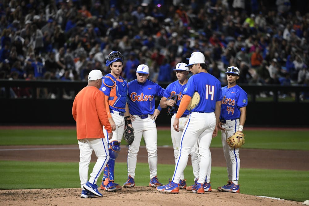 Florida baseball head coach Kevin O'Sullivan visits the mound in the Gators' win over Columbia University on Saturday, February 24, 2024. 