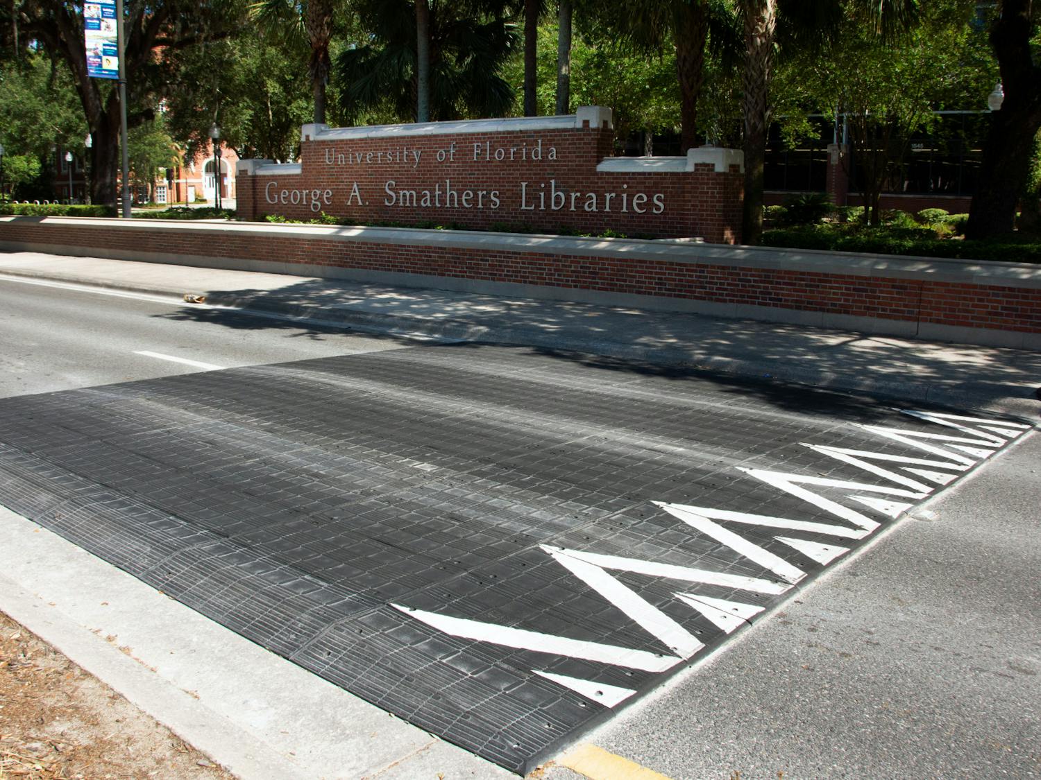 A new speed table rests outside the George A. Smathers Libraries at UF on Saturday, May 8, 2021. Speed tables were installed between Northwest 13th Street and Northwest 22nd Street in response to community outcry over recent traffic deaths on University Avenue. (Photo by Sam Schaffer)