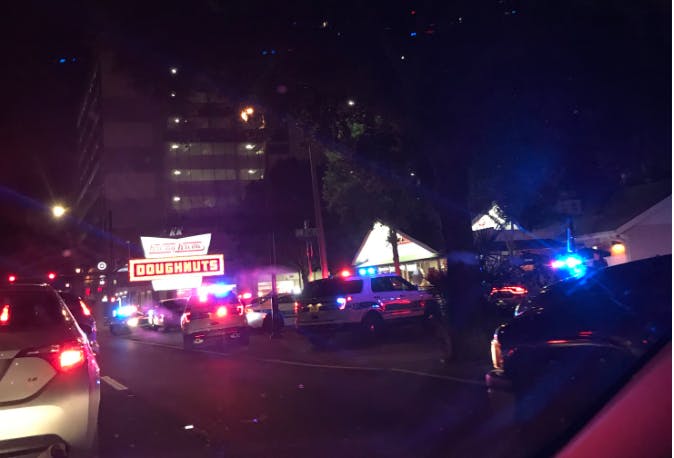 Police arrested a man accused of stabbing someone outside of Krispy Kreme Wednesday night.